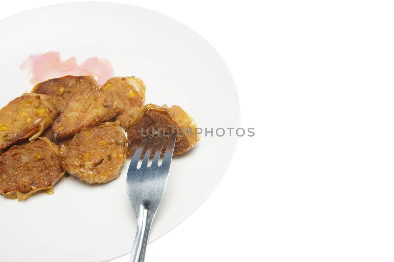 Close up deep fried roll vegetarian with ginger pickled and fork by eaglesky