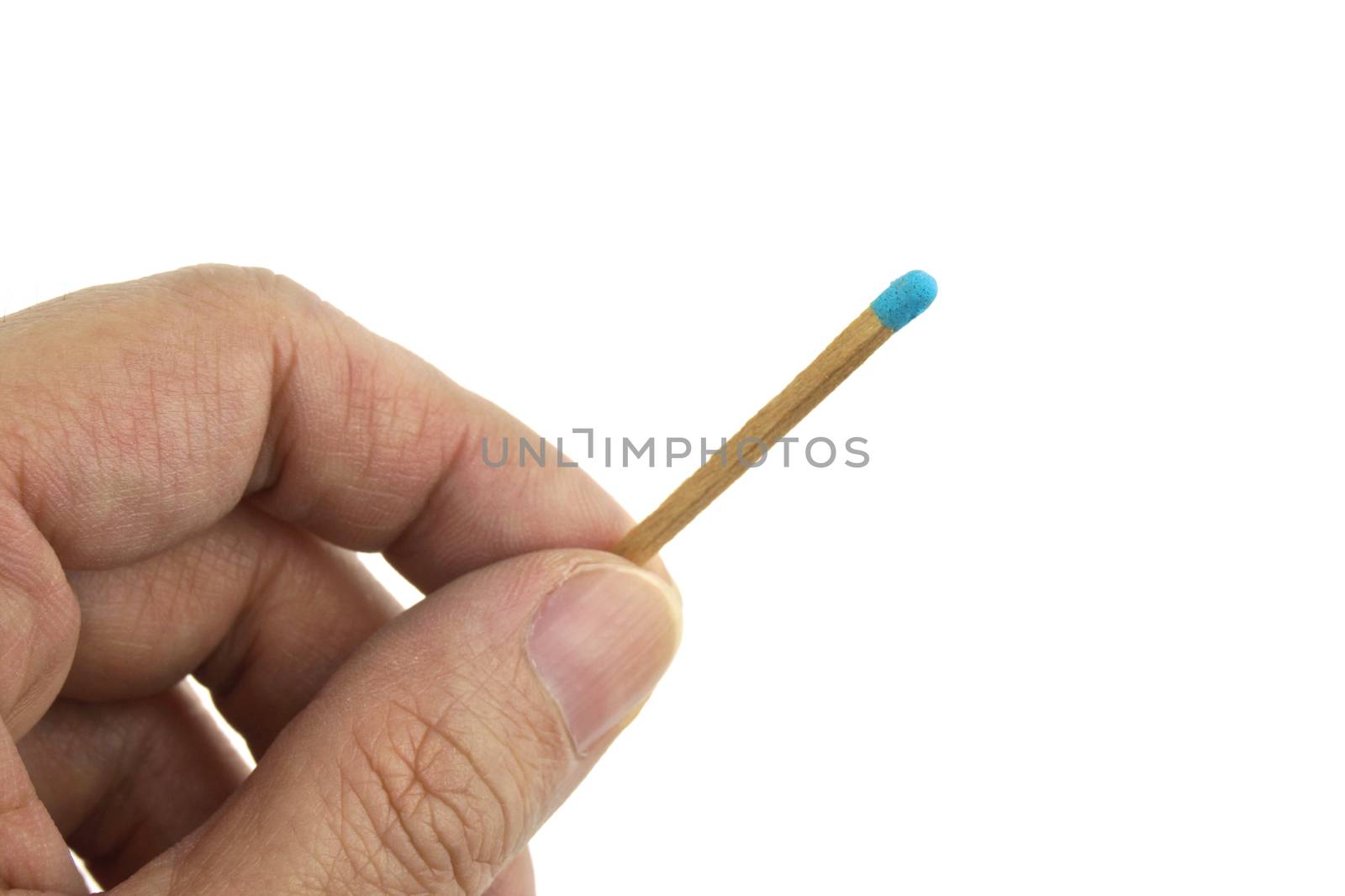 Hand hold blue matchstick for lit isolated with white background.