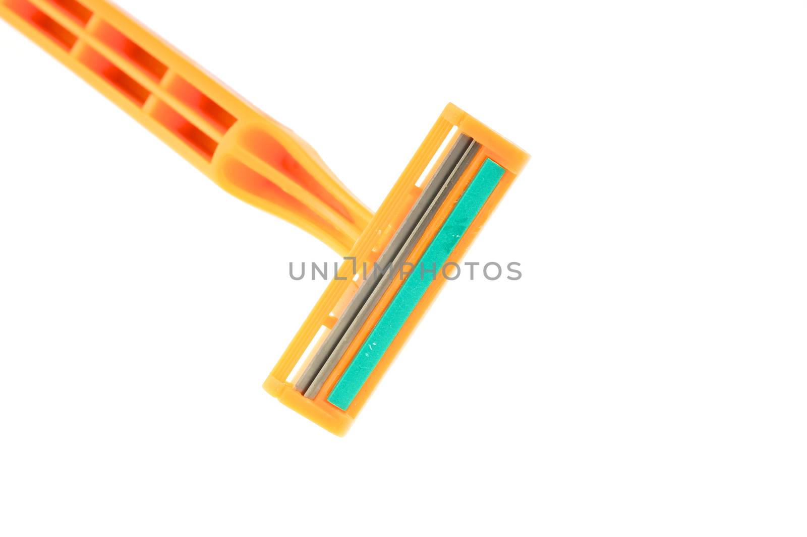 Orange razor for mustache or brows isolated on white background.