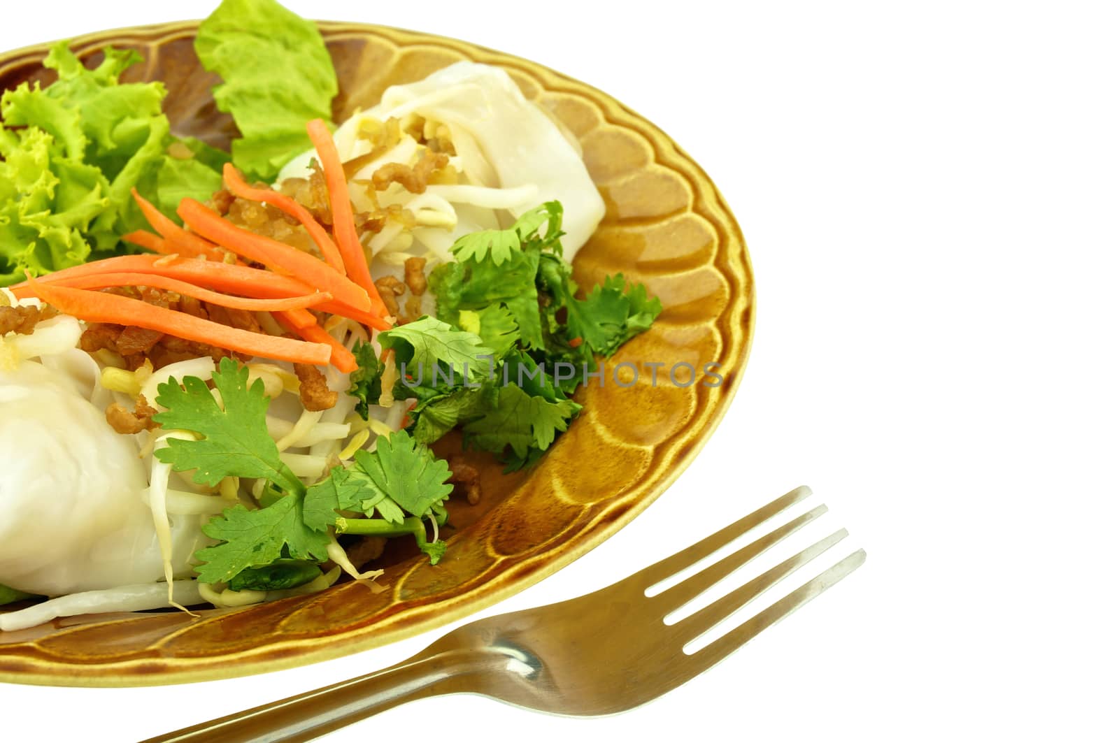 Close up wide rice noodle roll with fork isolated on white background.