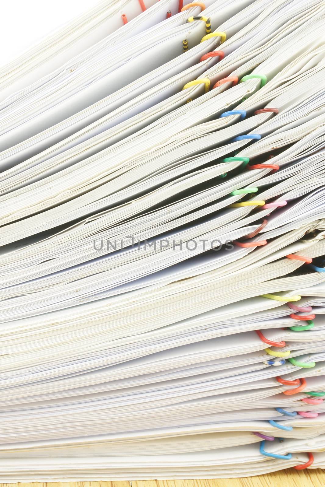 Close up stack document of account include sales and receipt place on wood background.