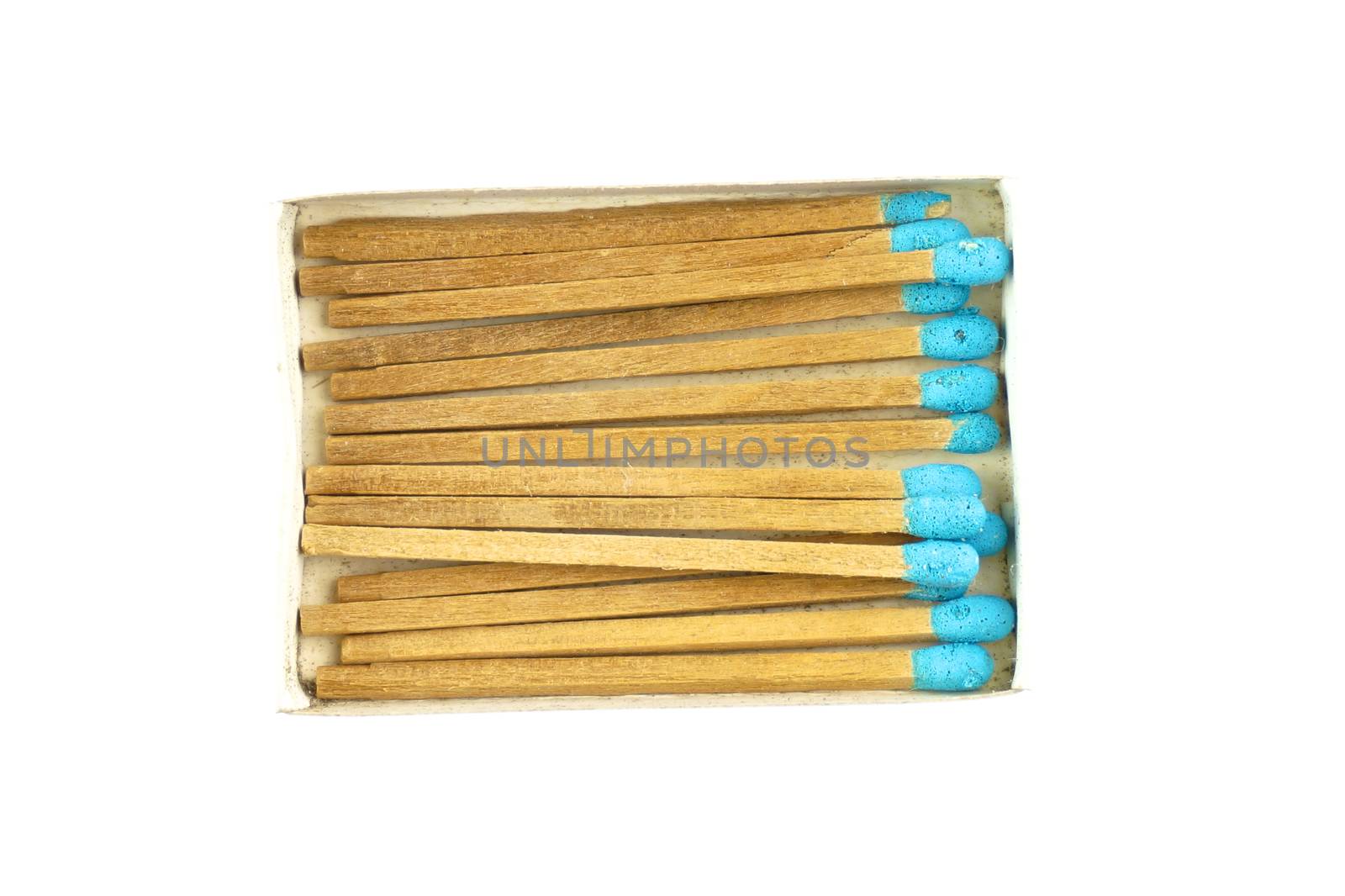 Blue wood matchstick in old box isolated with white background.