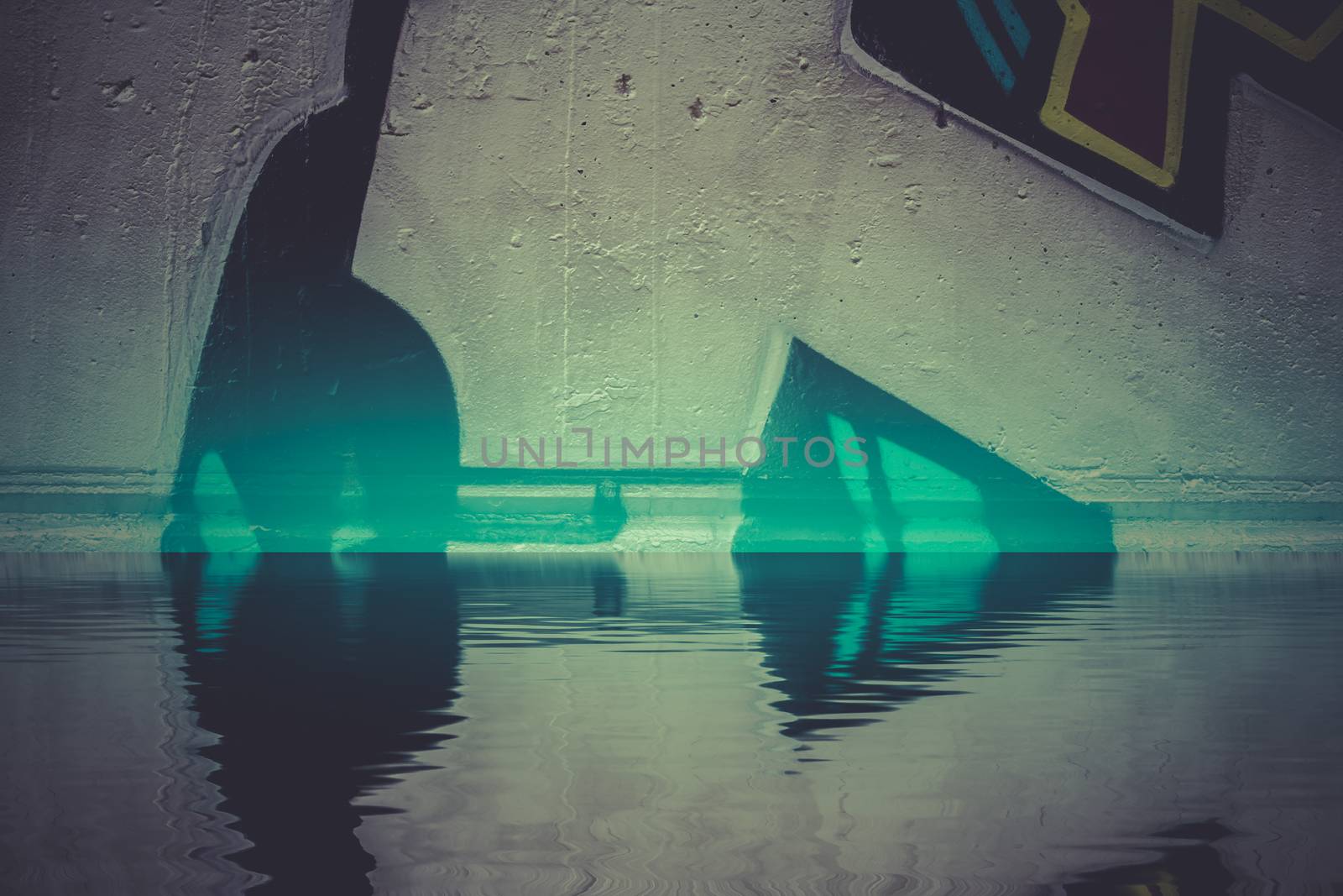 Graffiti reflection in the water, artistic urban arrows by FernandoCortes