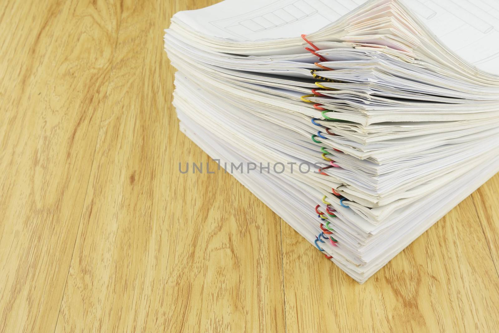 Stack document of account include sales and receipt place on wood background.