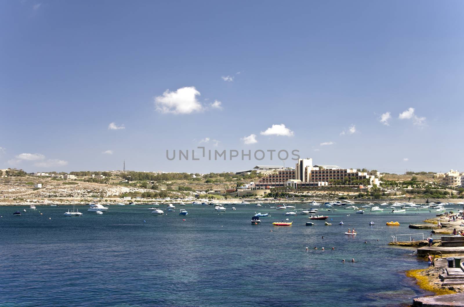 Salina Bay in the north-western part of Malta island with tourist facilities in the background - Bugibba, Malta