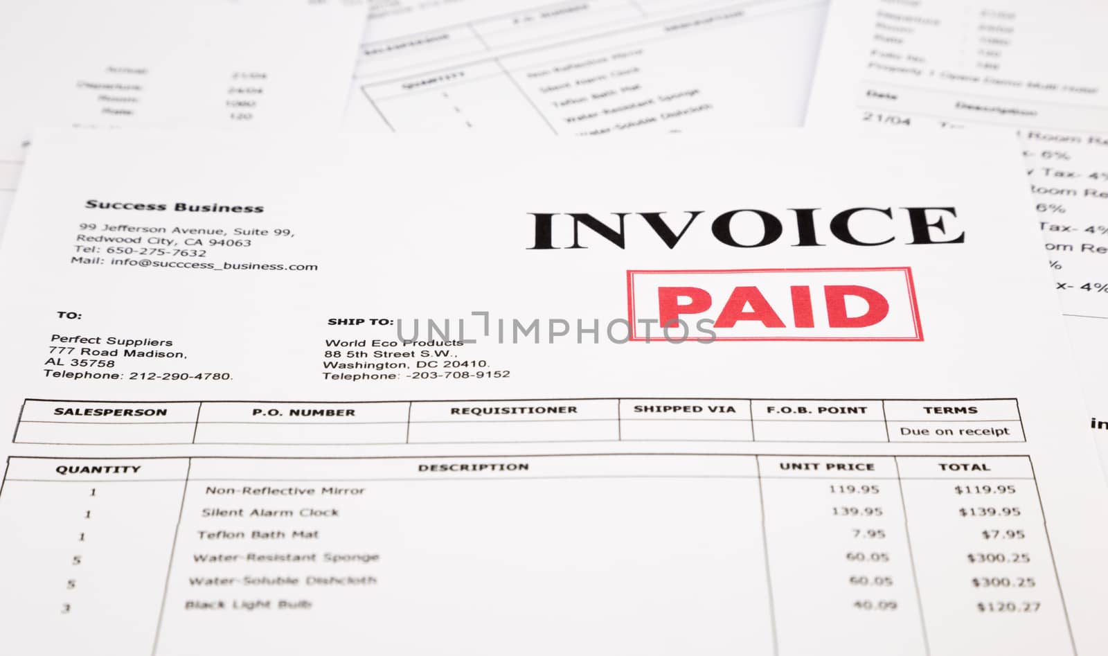 invoice and bills with paid stamp by vinnstock