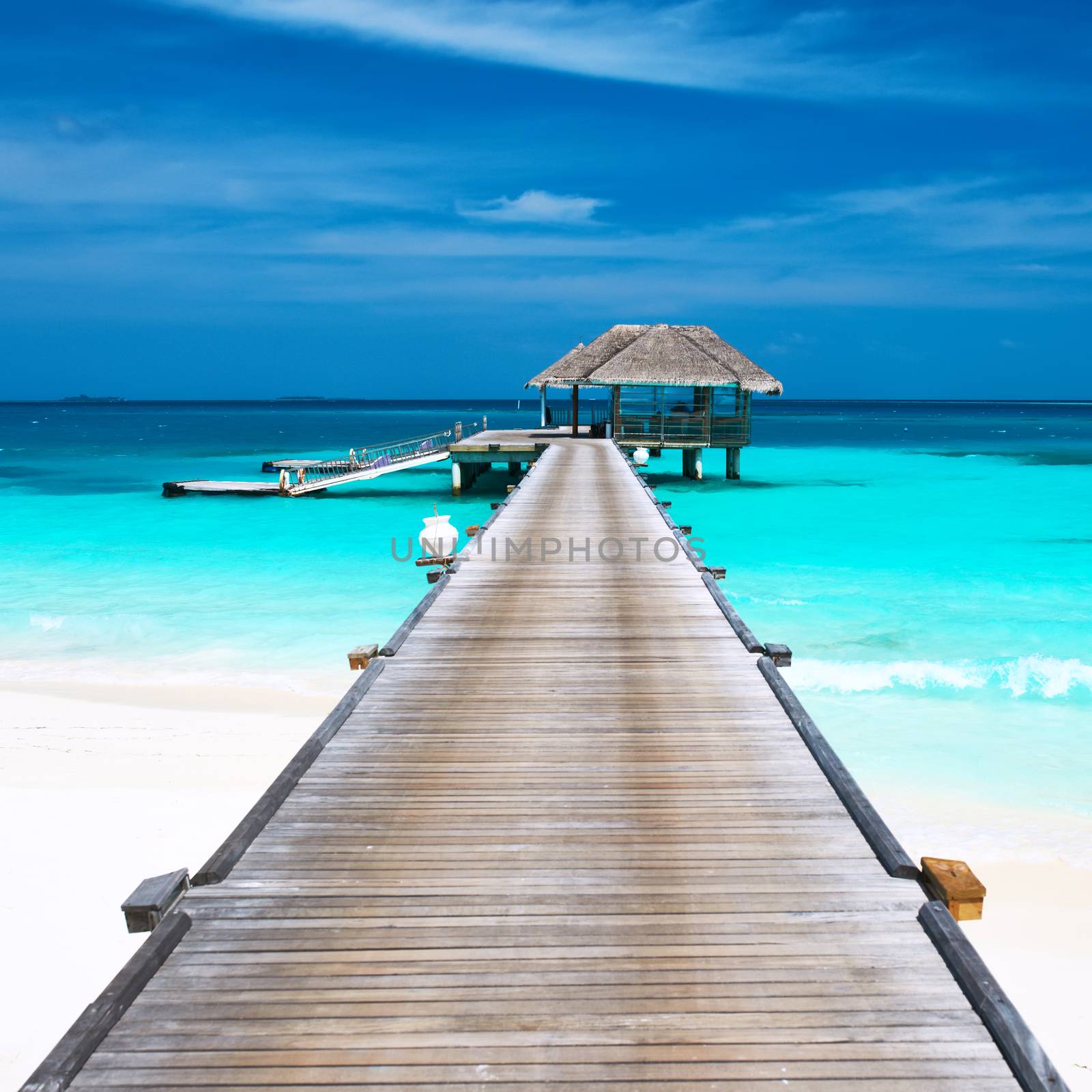 Beautiful beach with water bungalows at Maldives