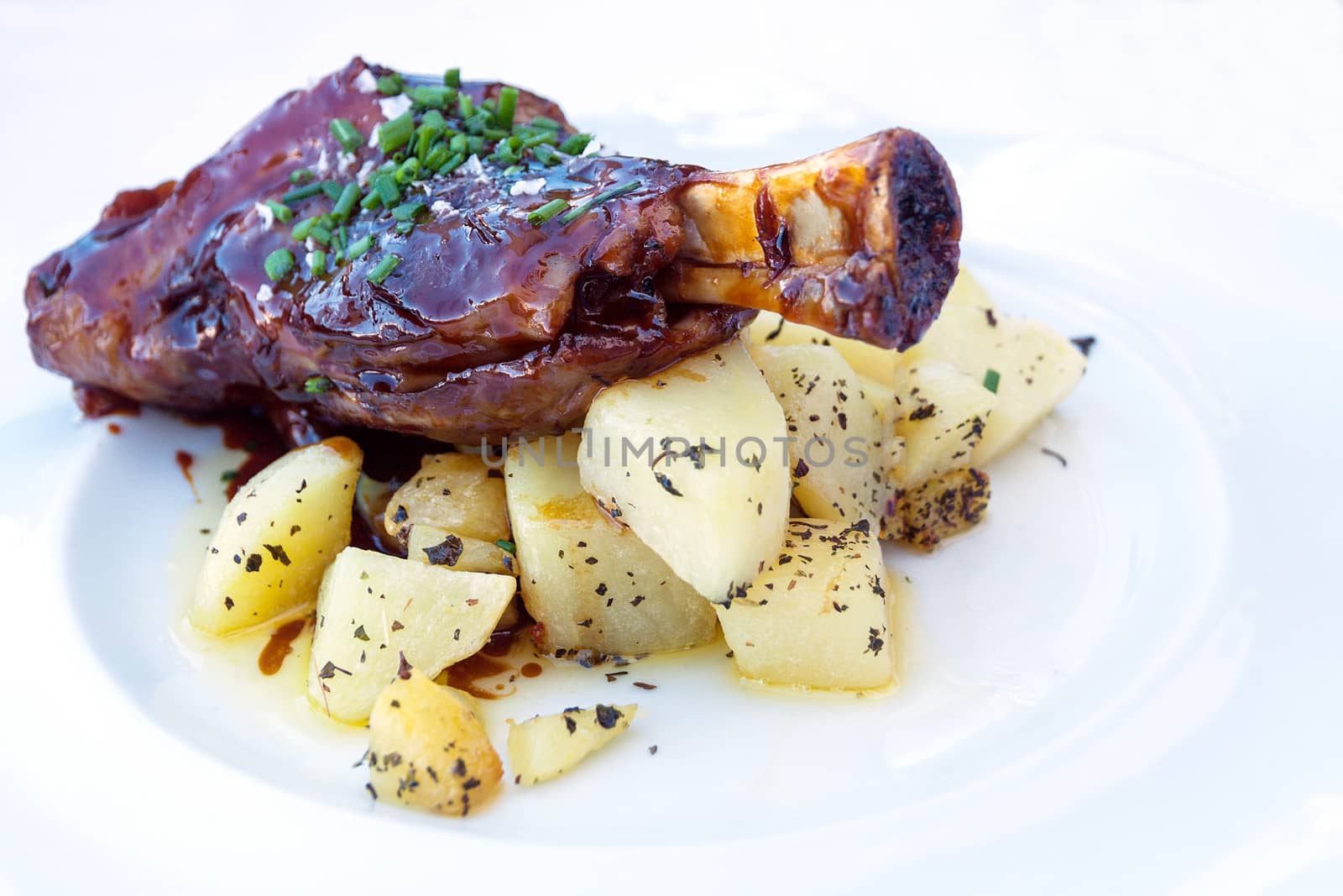 Braised lamb shank with potatoes by serpl