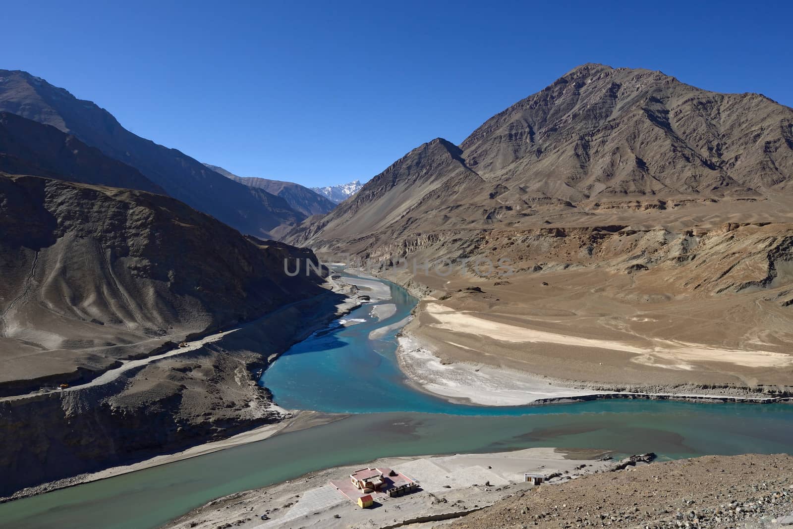 Confluence of Zanskar and Indus rivers - Leh, Ladakh, India by think4photop