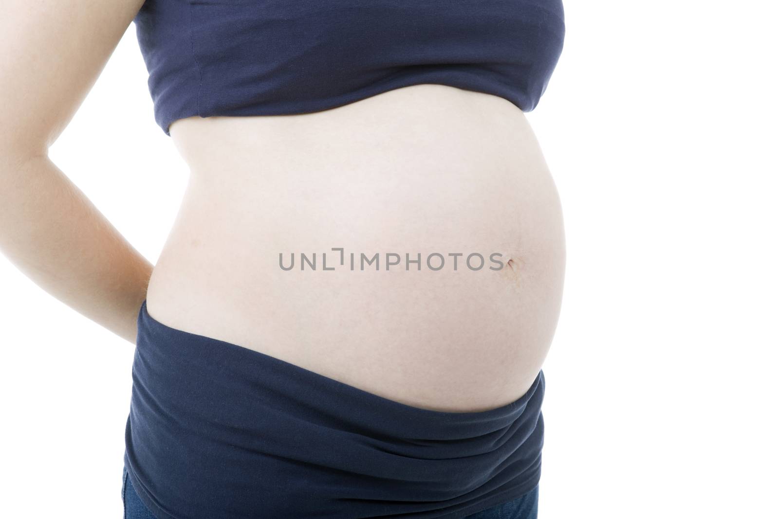 Closeup of pregnant woman at white background