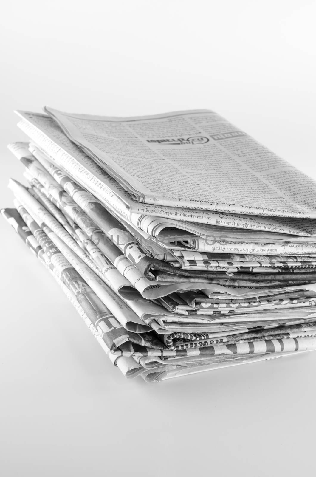 stack of newspaper by ammza12