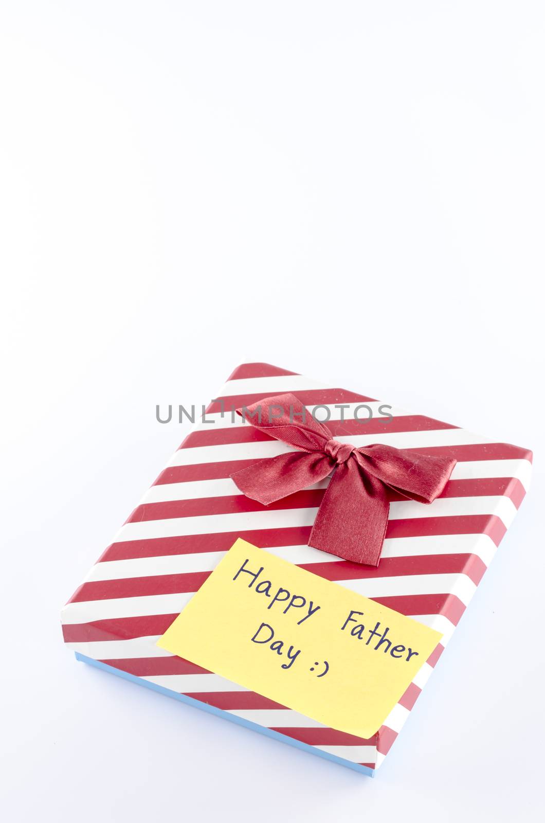 gift box with card tag write happy fathe day word on a white background