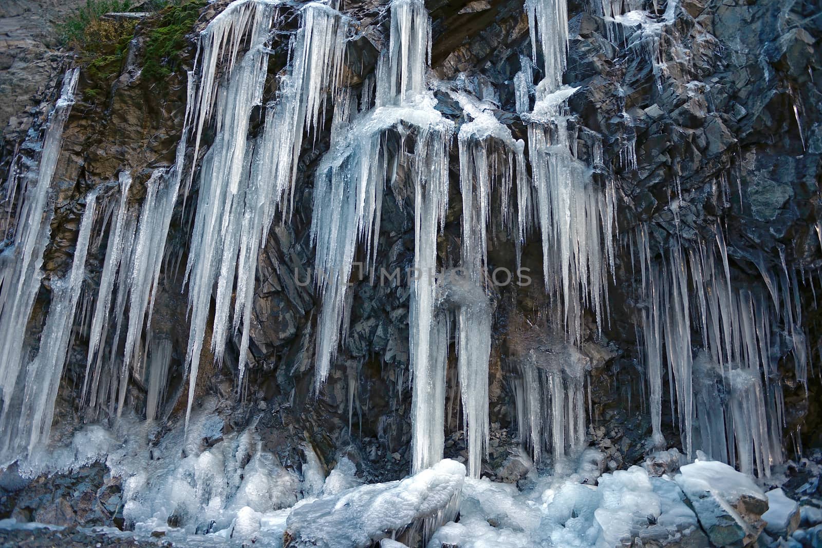 water icicles in winter time at Leh, India by think4photop