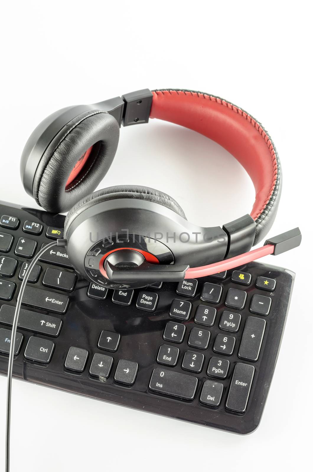 keyboard computer and headphone on a white background
