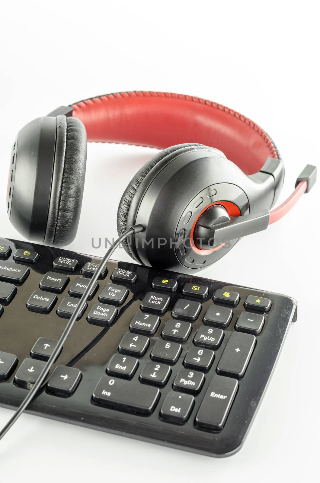 keyboard computer and headphone on a white background