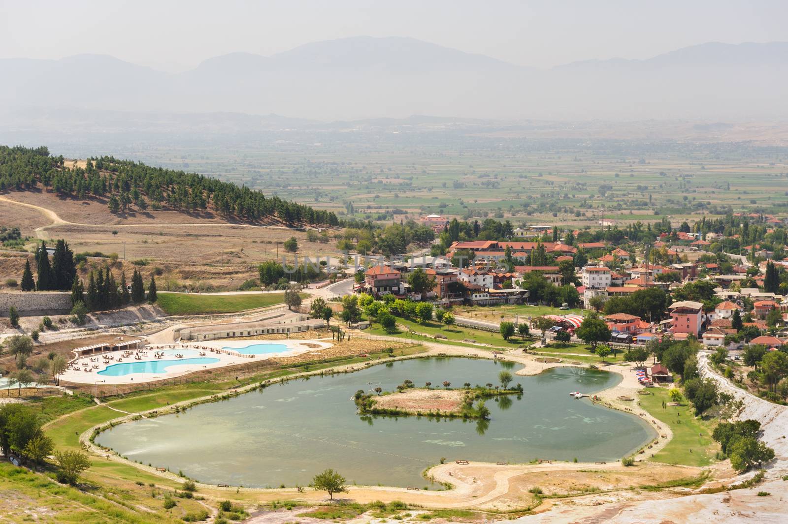 Pamukkale view from high point to city and valley with lake