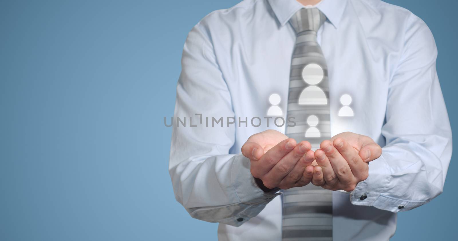 Businessman holding social media people icons in hands