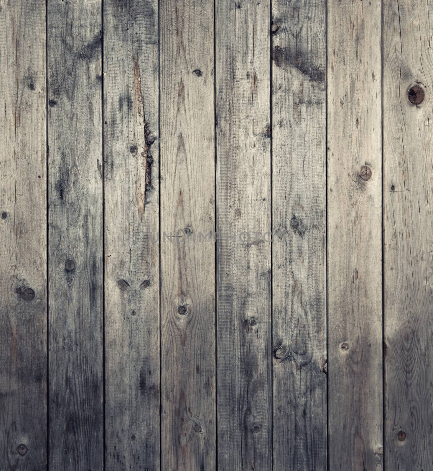 Grungy wooden background. Real seasoned wood.