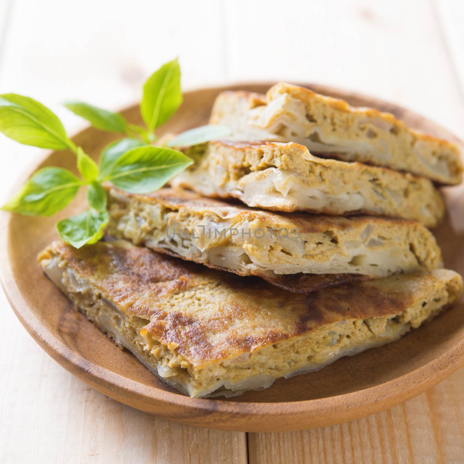 Malaysian food murtabak usually sold in Indian Muslim restaurants and stalls , stuffed with minced mutton, garlic, egg and onion, and is eaten with curry gravy.