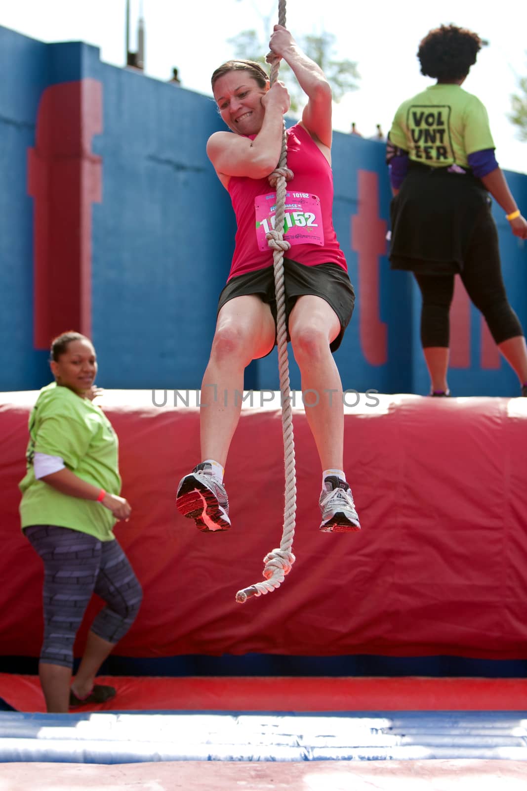 Young Woman Swings With Rope In Crazy Obstacle Race by BluIz60