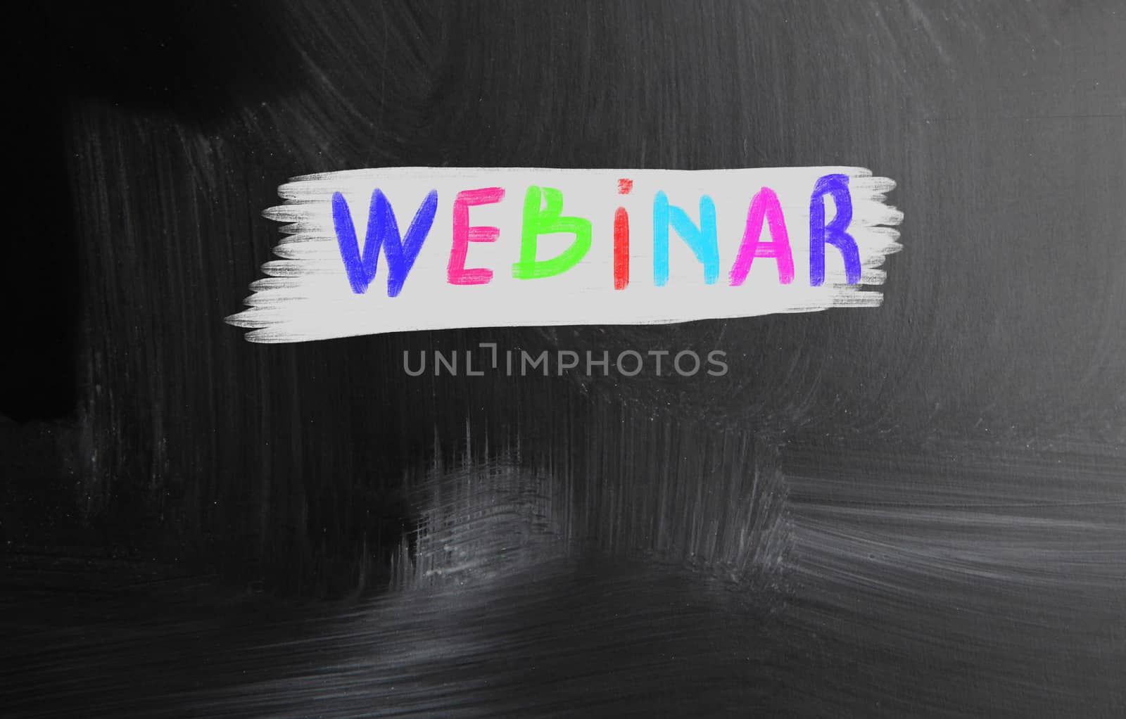 webinar handwritten with chalk on a blackboard