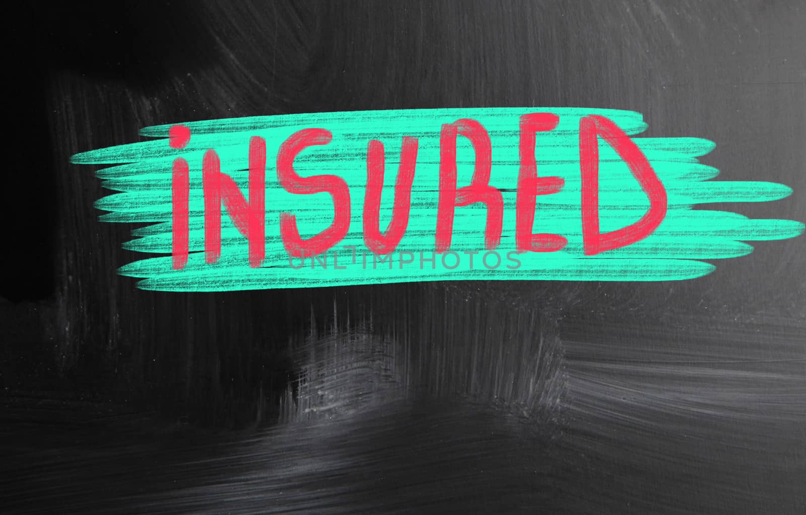 insured handwritten with chalk on a blackboard