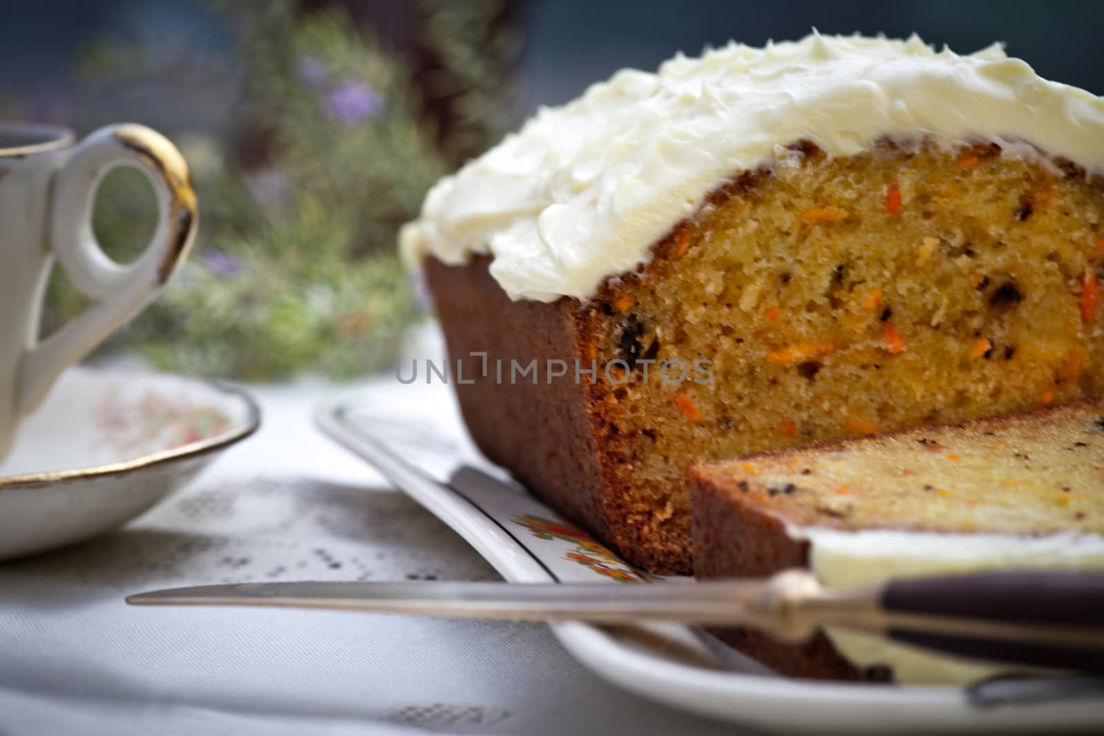 Beautiful and delicious homemade carrot cake on antique tableware