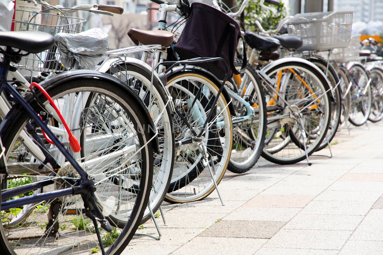 Bicycles parked on a street in Tokyo, Japan