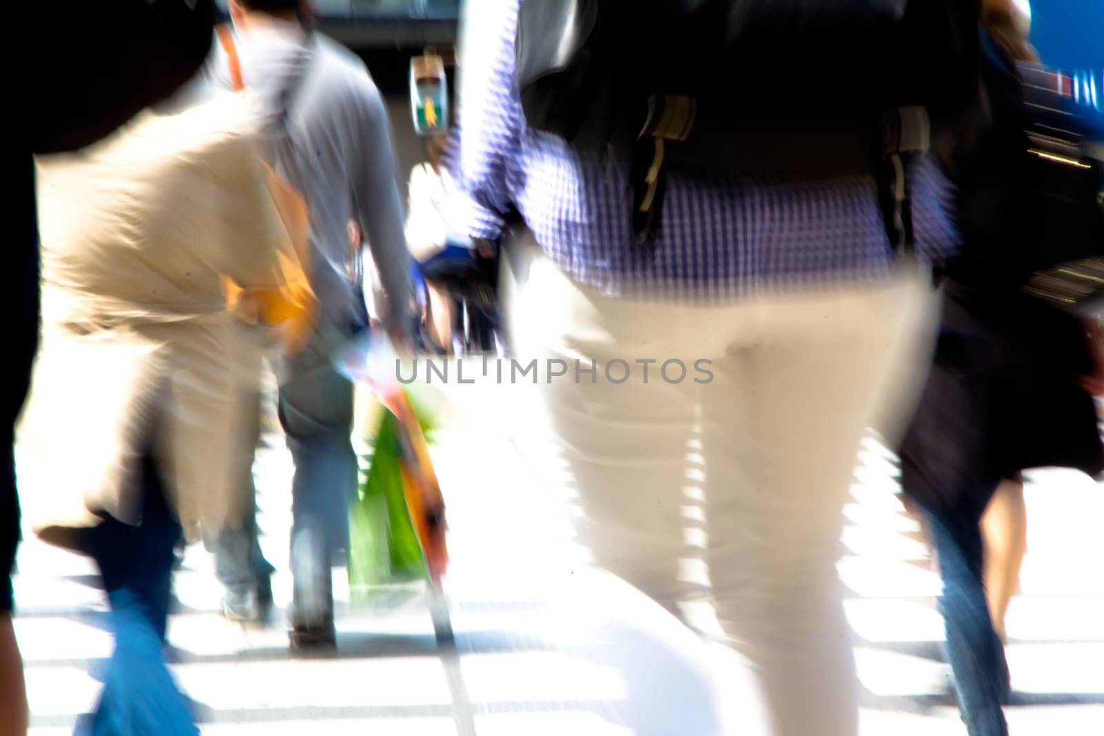 People commuting in rush hour at zebra crossing,Tokyo japan