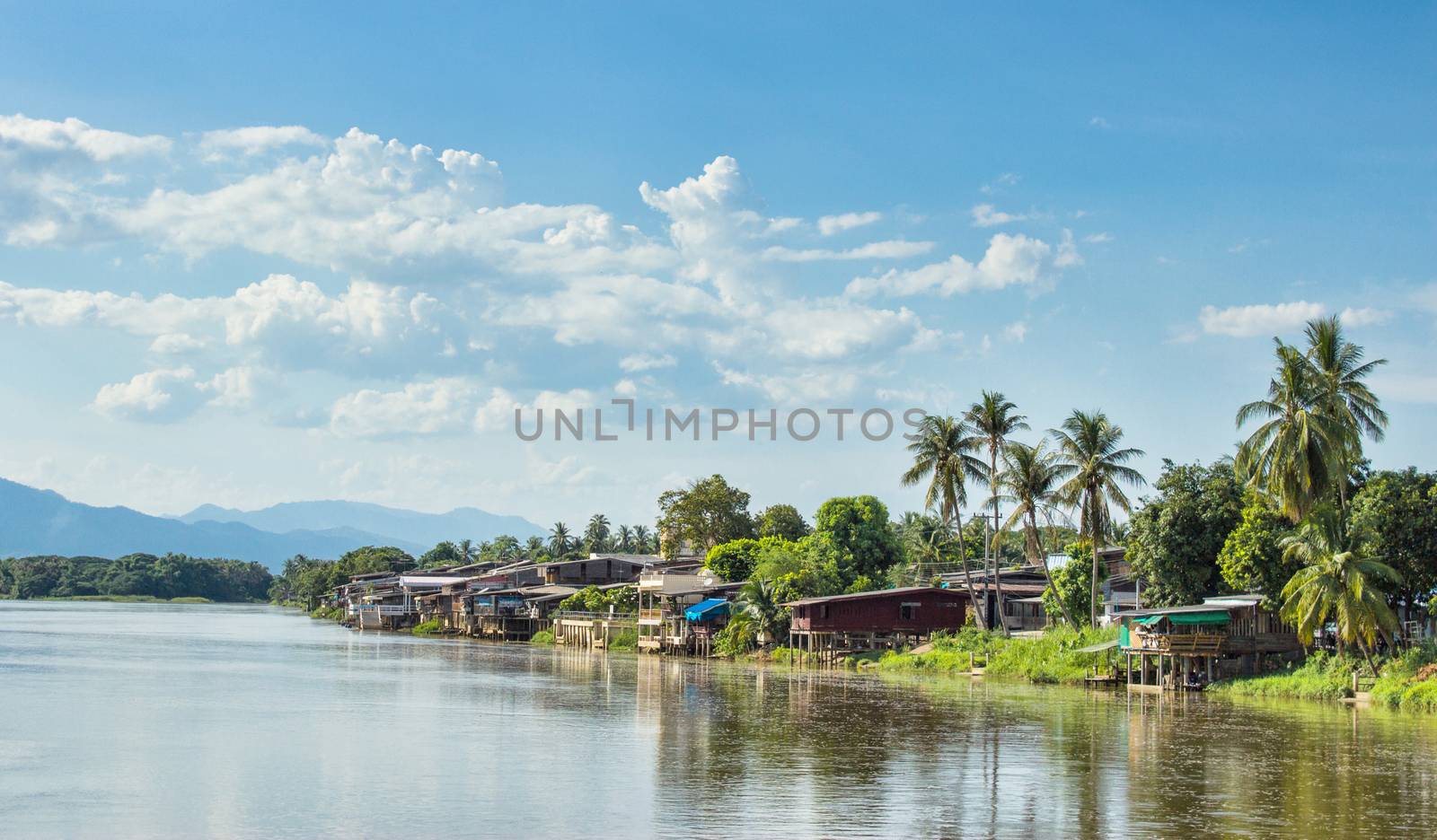 Communities living along the Ping River  by yod67