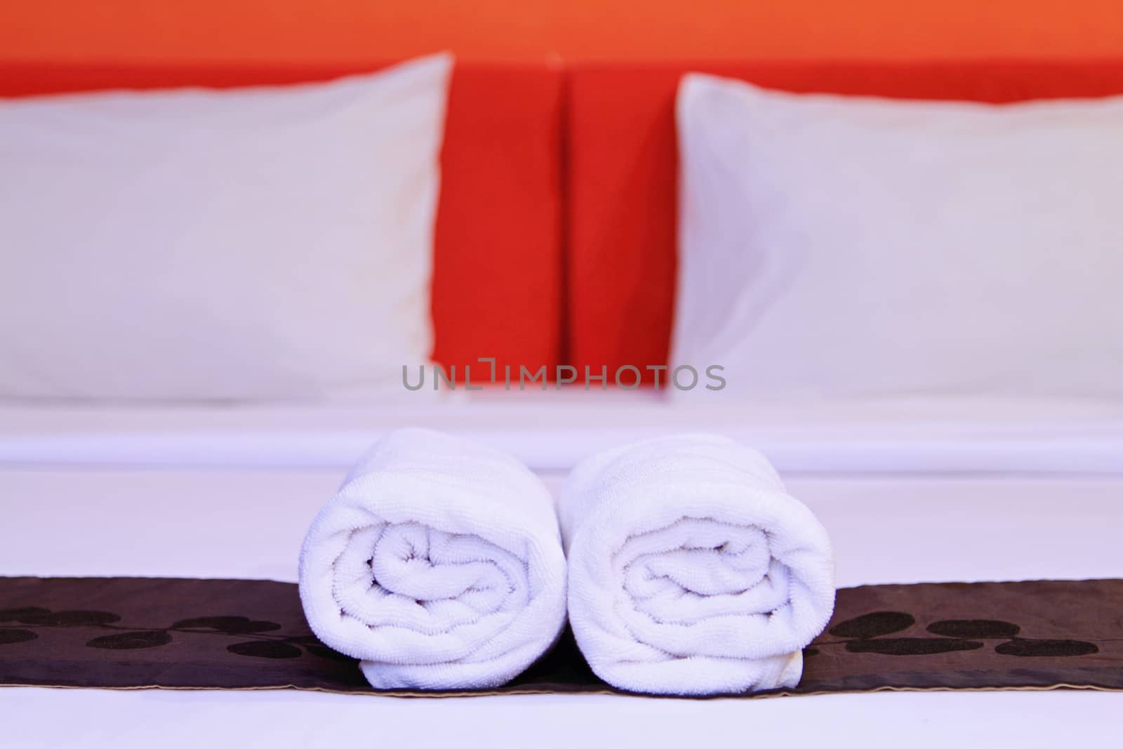White clean towels on the hotel bed