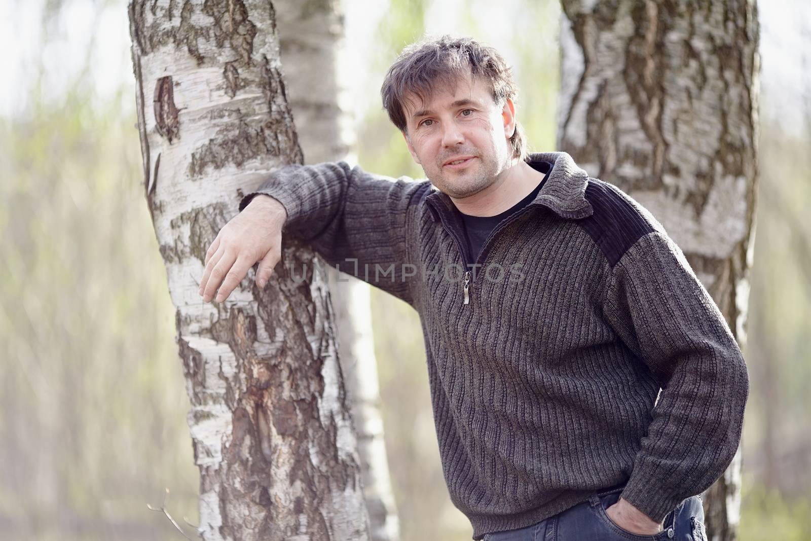 Portrait of the young man. Young man. The young man outdoors.