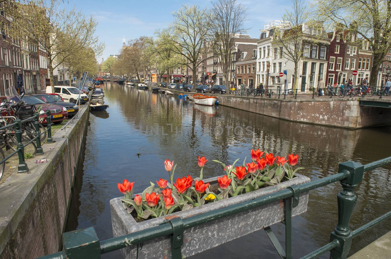 Amsterdam, The Netherlands - April 05, 2014: Amsterdam is the most watery city in the world. The number of canals have led Amsterdam to become known as “The Venice of the North”. 