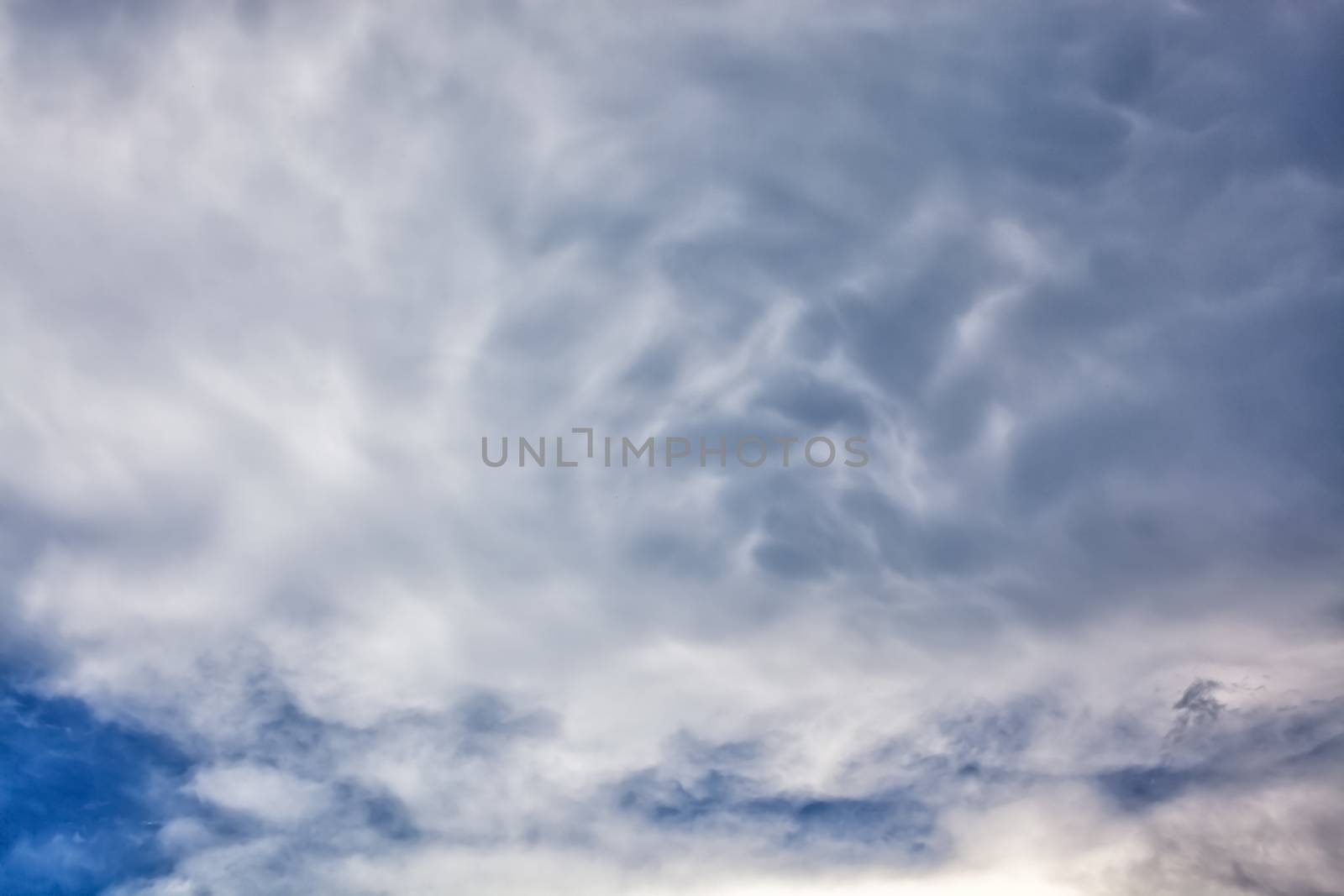 White easy clouds in the blue sky