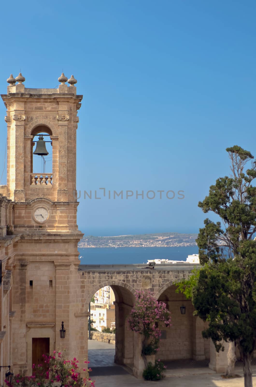 Bell tower of the Church of the Our Lady of Mellieha, place of pilgrimage since medieval times - Mellieha, Malta.