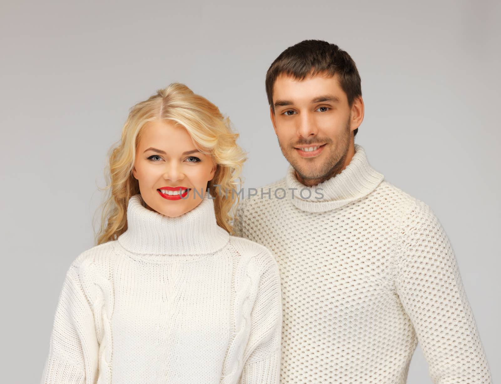 family couple in a sweaters by dolgachov