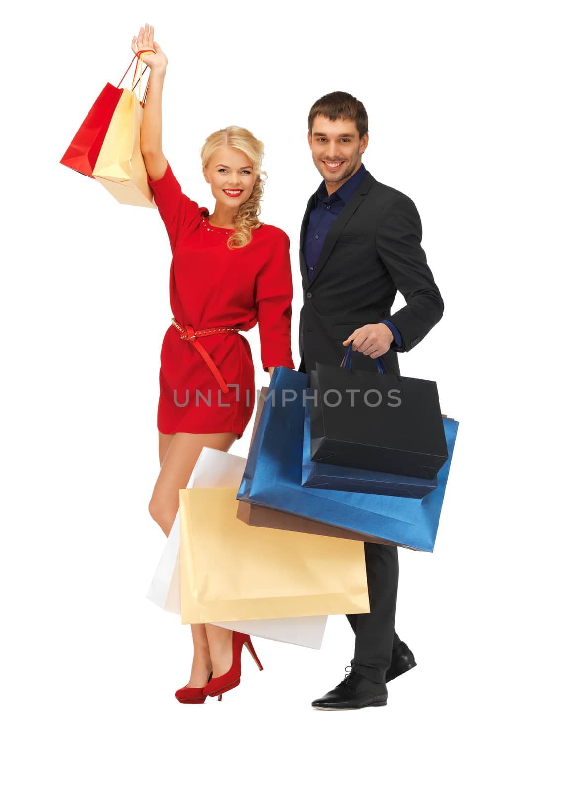 man and woman with shopping bags by dolgachov