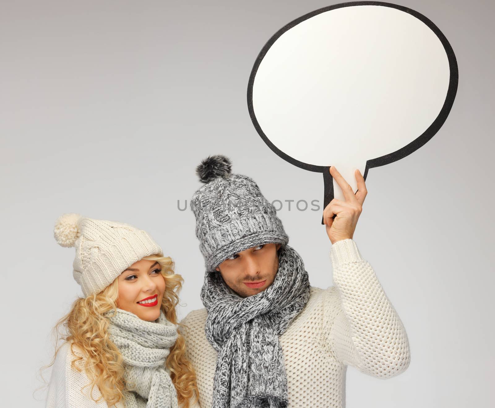 family couple with blank text bubble by dolgachov