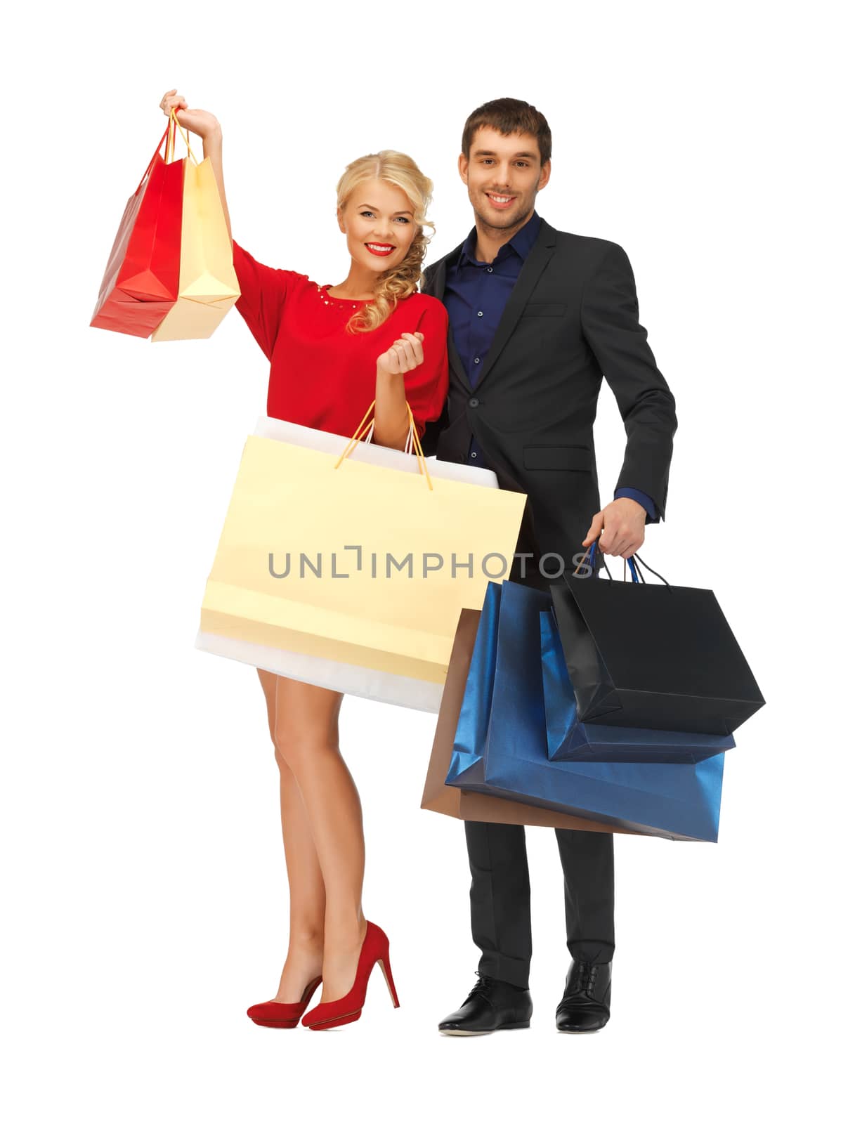 man and woman with shopping bags by dolgachov