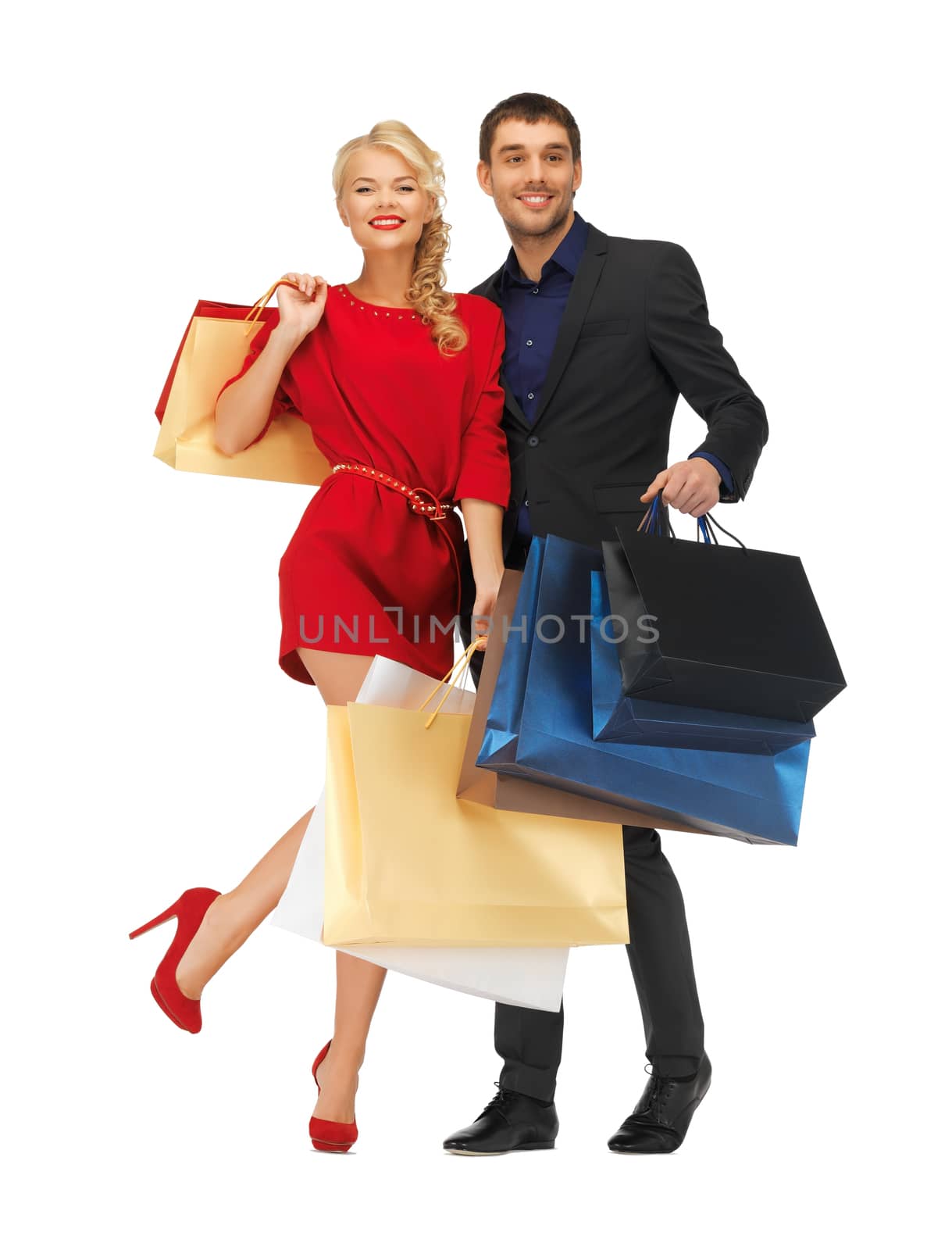 man and woman with shopping bags by dolgachov