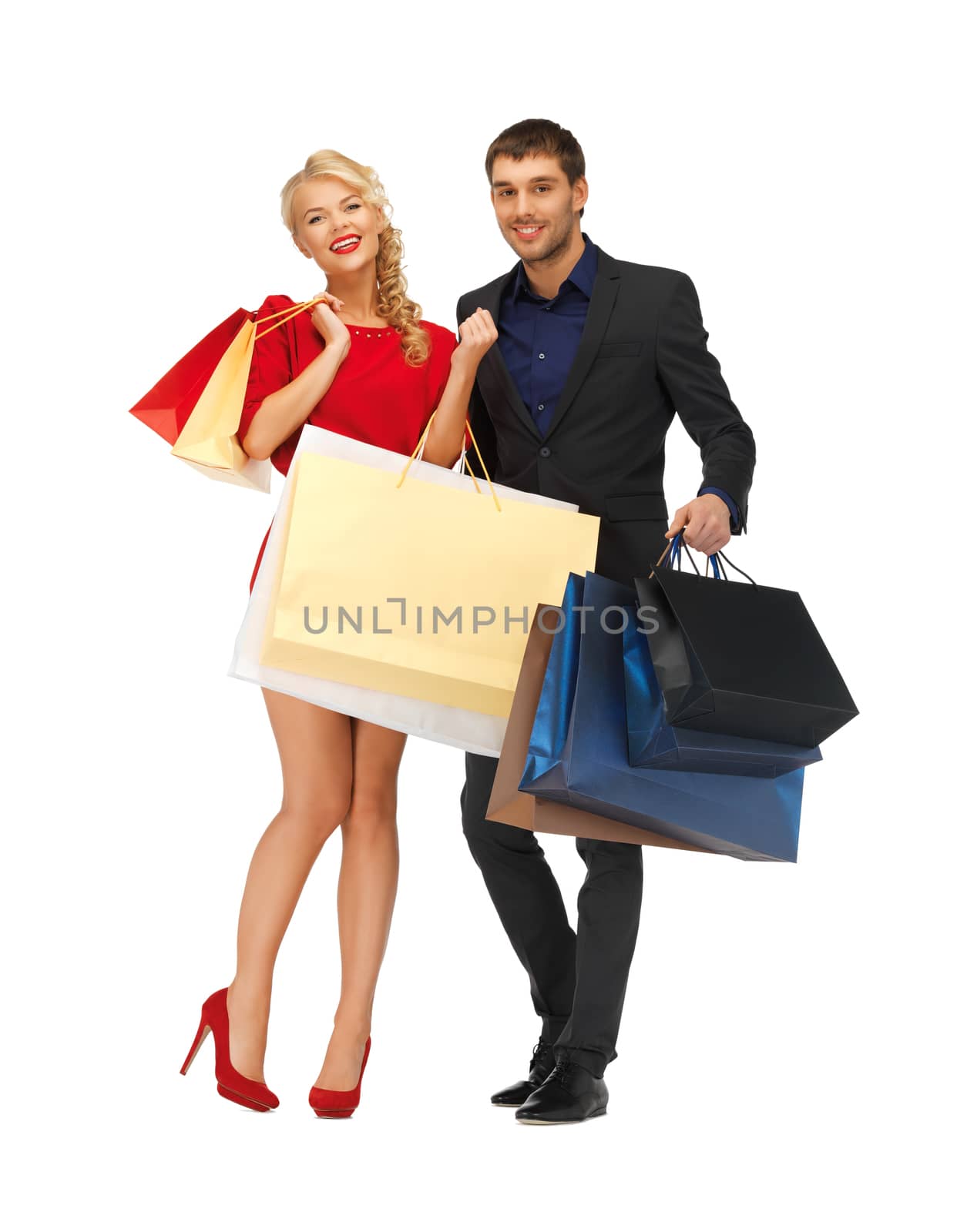 man and woman with shopping bags by dolgachov