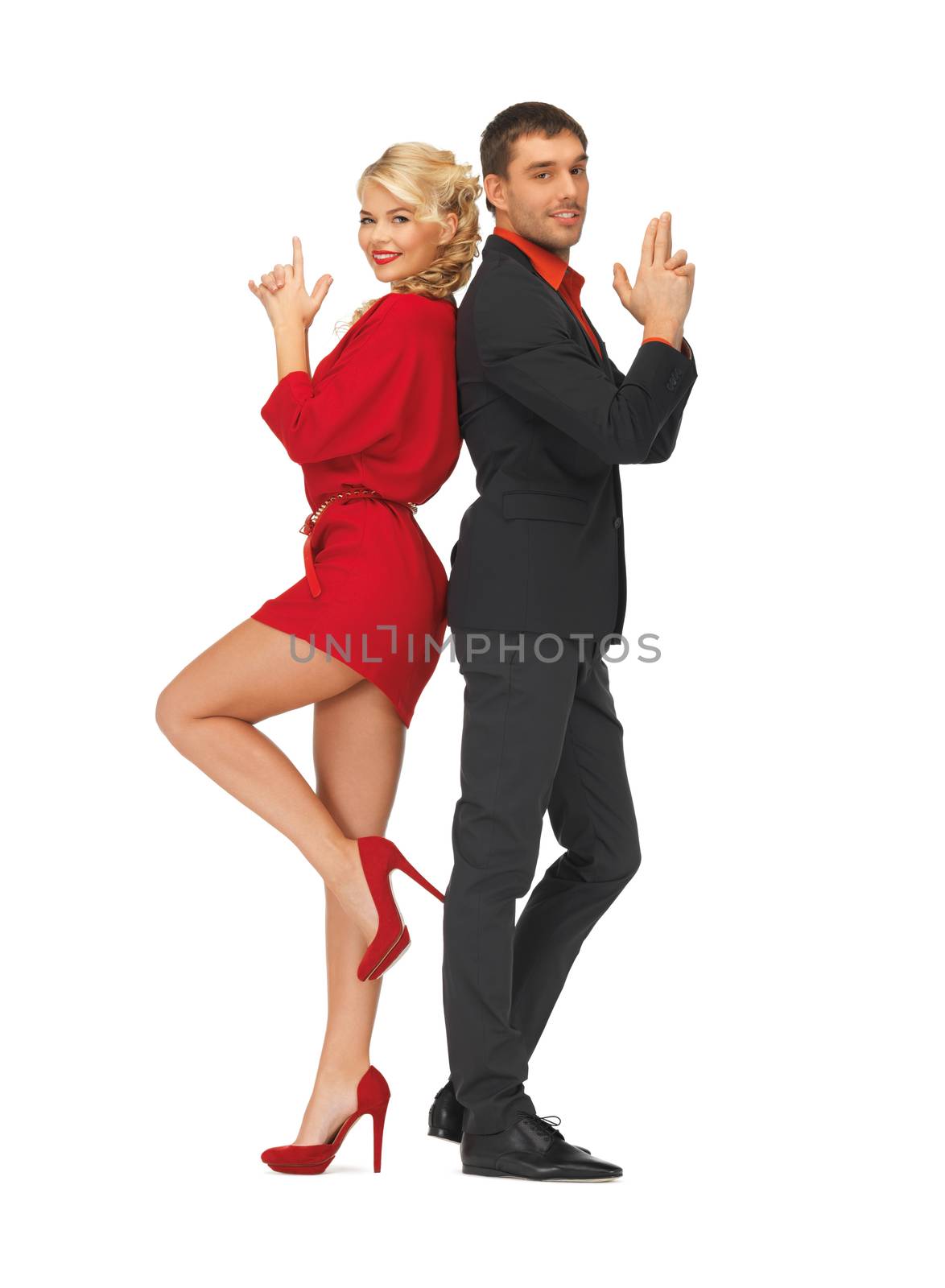 picture of man and woman making a gun gesture