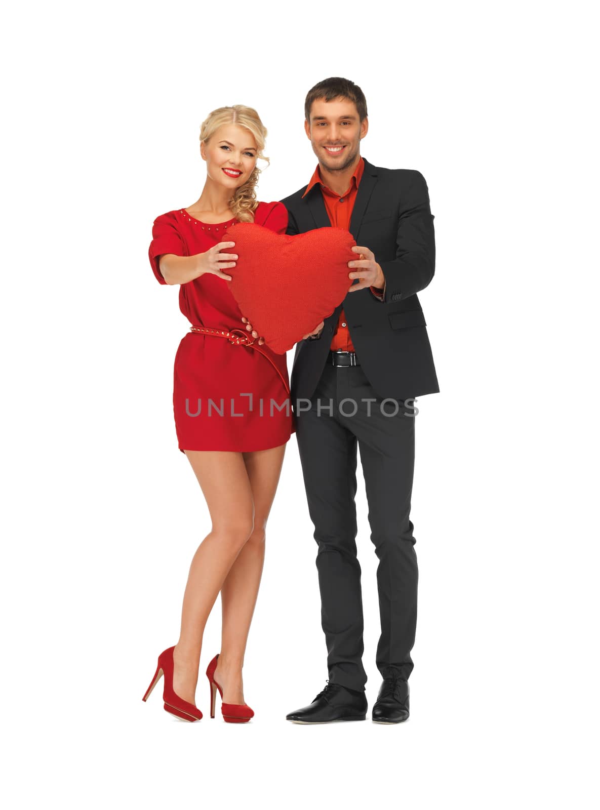 beautiful couple holding big heart by dolgachov