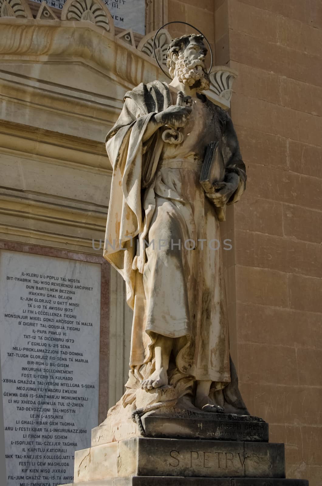 Statue of St Paul in front of monumental parish church of St Mary, dedicated to the Assumption of Our Lady, known as the Mosta Rotunda or Mosta Dome - Mosta, Malta.
