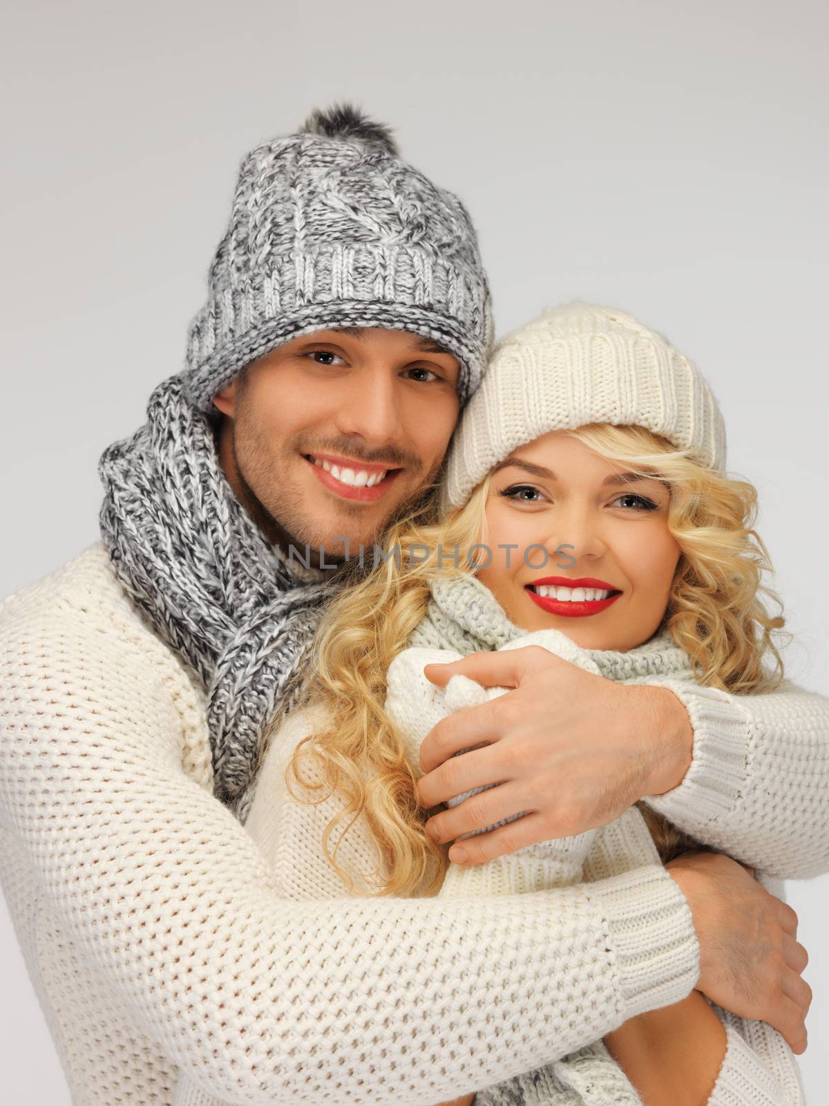 family couple in a winter clothes by dolgachov