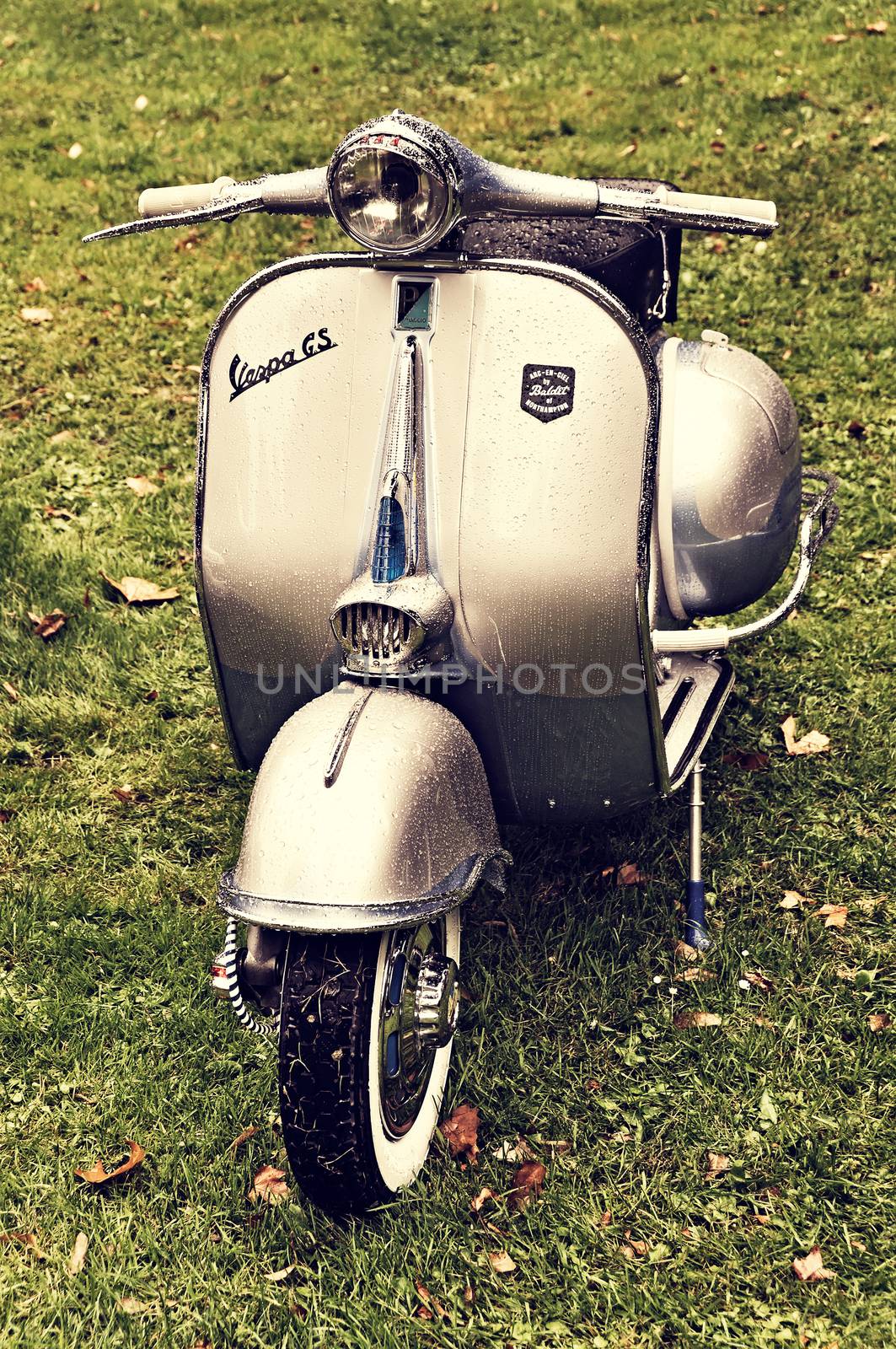 LONDON, UK - CIRCA SEPTEMBER 2011: A Vespa GS scooter after the rain.