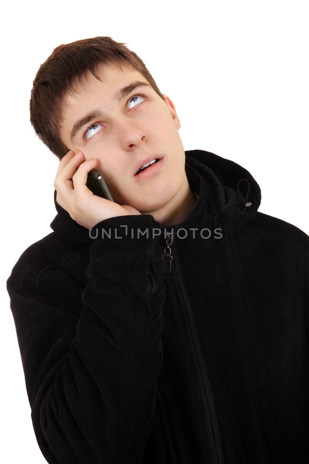 Annoyed Teenager in the Coat with Cellphone Isolated on the White Background