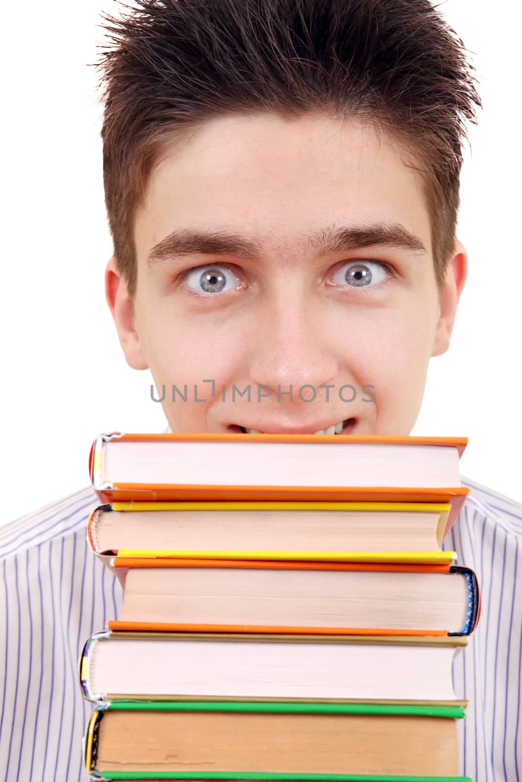 Cheerful Student behind the Books Isolated on the White Background