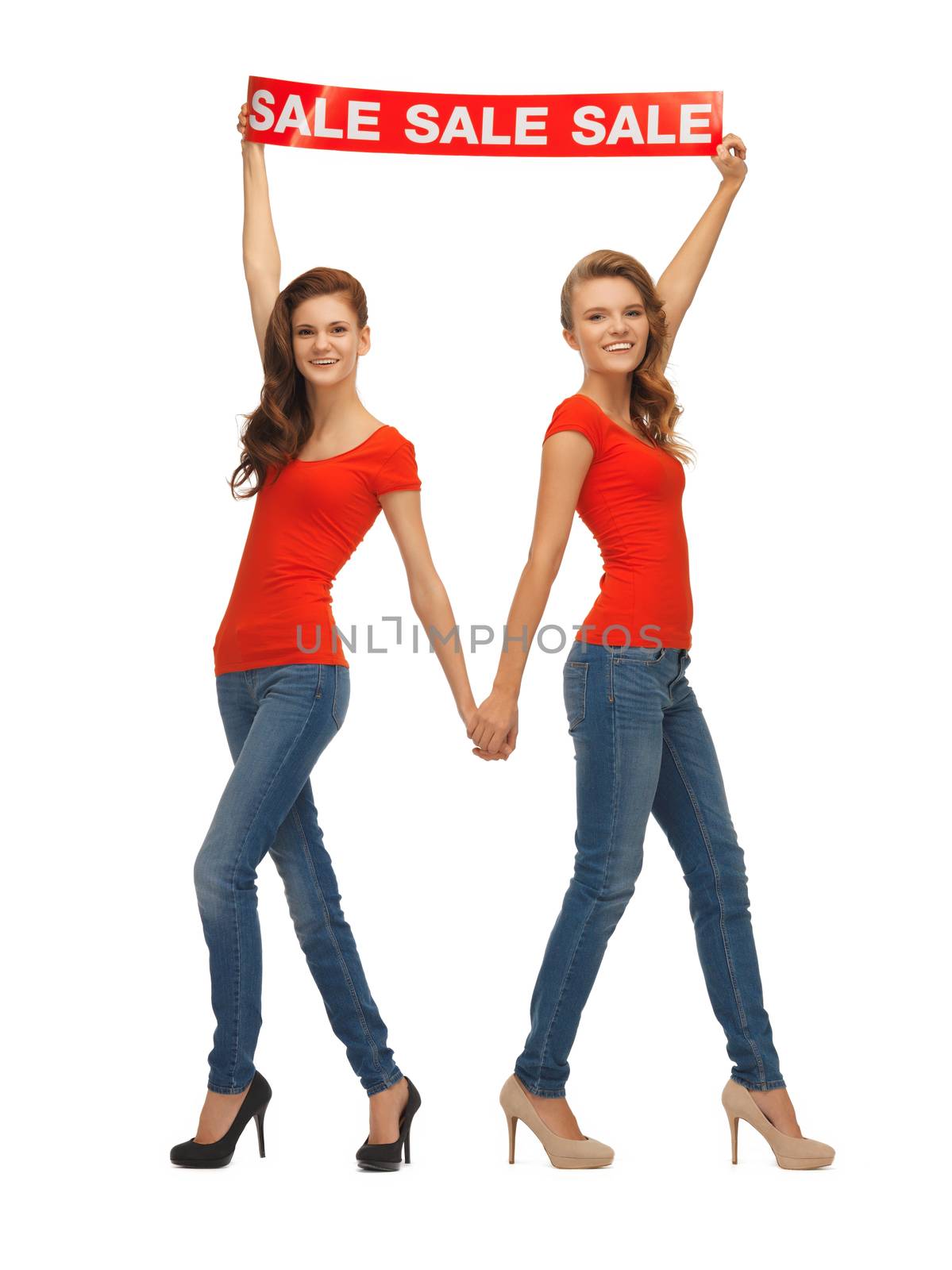 two teenage girls in red t-shirts with sale sign