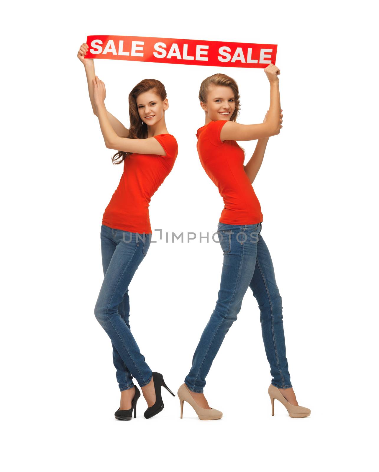 two teenage girls in red t-shirts with sale sign